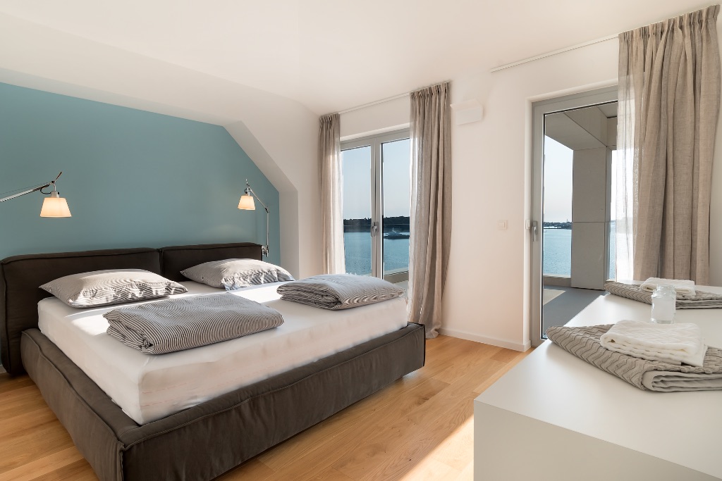 Master Bedroom on 2nd floor with direct access to lounge and terrace, 180° sea view
