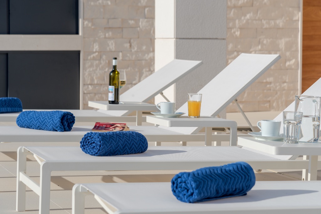 Pool area with sun loungers
